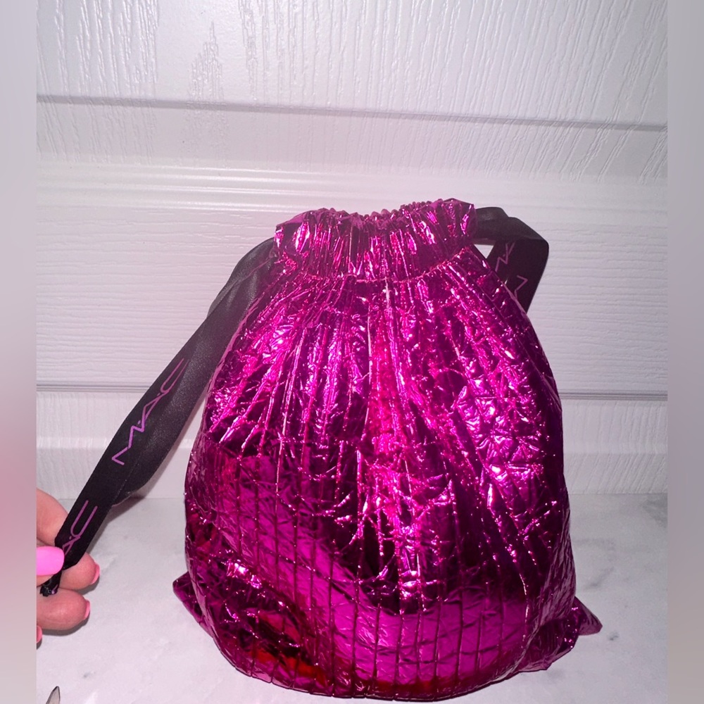 Mac makeup bag with 11 empty mac containers for turn in program